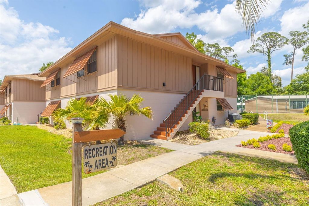 Photo of 180 Magnolia Woods Court #15B, Deltona, FL 32725 (MLS # O6404436)