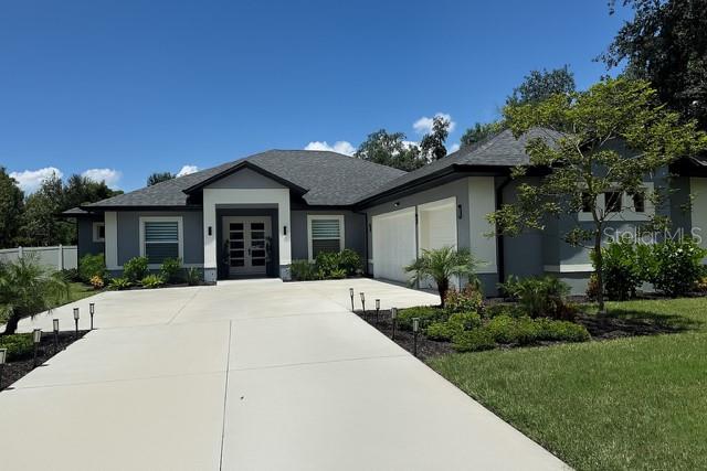 Discover the perfect blend of elegance, functionality, and natural serenity in this stunning 2024-built, one-story gem, nestled in the highly sought-after Mill Stream community of Narcoossee—just minutes from Lake Nona. Designed with comfort and timeless style in mind, this beautifully crafted five-bedroom residence offers a bright, open-concept floor plan, featuring a charming breakfast nook, a formal dining room ideal for entertaining, and a gourmet kitchen that combines sophistication and practicality, boasting an expansive quartz island, 42" soft-close cabinetry, sleek black stainless-steel appliances, and stylish pendant lighting. Throughout the home, elevated finishes such as tray ceilings and 24" designer tile flooring contribute to an atmosphere of refined luxury. Each bedroom is generously sized, with two featuring walk-in closets. One of the bedrooms offers the flexibility to serve as a dedicated home office, studio, or creative space—perfect for today’s evolving lifestyle needs. Set on an expansive 0.5-acre lot, the property features a beautifully landscaped front and backyard, a covered patio ideal for relaxing or entertaining, and a spacious three-car garage with ample room for vehicles, storage, or a personal workshop. For nature lovers and those seeking peaceful surroundings, this neighborhood is a dream—enclosed by lush greenery, mature trees, and a sense of tranquility that’s hard to find. Whether you're enjoying morning walks, weekend gatherings, or quiet evenings under the stars, this is the lifestyle you've been waiting for. Conveniently located near the 417 Expressway and just a short drive to premier shopping, dining, grocery stores, and outdoor getaways, this home offers the best of both worlds: serenity, comfort, and accessibility. Don’t miss your chance to own this exceptional property, schedule your private showing today!