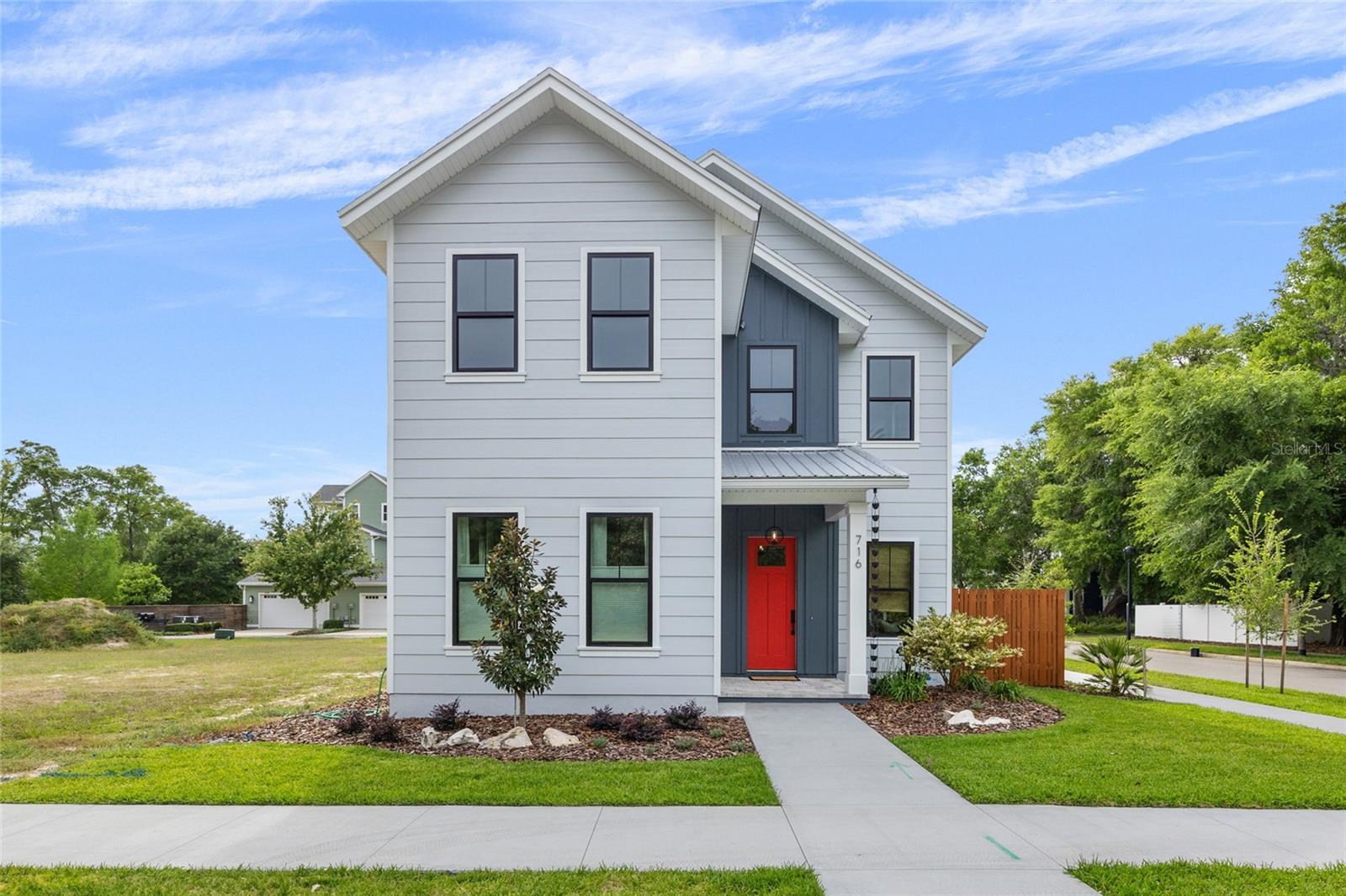 Stunning multi-generational 4-bedroom, 3.5-bathroom home in the desirable Town of Tioga. This two-story, 2,710 sq ft home offers a unique layout with a primary suite on the main level featuring a walk-through closet connected to the laundry room, and a second primary suite upstairs with an additional laundry room and flex space. Designed for modern living, the great room includes a dry bar perfect for entertaining, while the back porch is prepped for a summer kitchen, creating a seamless indoor-outdoor experience. A convenient drop zone and half bath near the garage entrance cater to busy lifestyles, making this home perfect for families seeking luxury and functionality in a vibrant community. Tioga itself is a golf cart-friendly town, providing a unique and enjoyable way to explore the area. The community also offers a range of amenities, including parks, trails, and recreational facilities. Conveniently located near shops, restaurants, and entertainment options, this home combines tranquility with easy access to modern conveniences. Neighborhood amenities – pickleball court, clubhouse, community pool, playground, tennis courts, sand volleyball, basketball courts, walking trails, and adjacent to Tioga Town Center with fine dining, shopping, and Gainesville Health and Fitness. Approximately 4 miles to I-75, 4.5 miles to North Florida Regional, 8 miles to the University of Florida, and 11 miles to Shands.