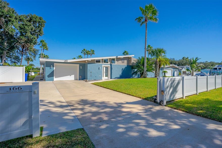 ALMOST AN FULL ACRE OF DIRECT RIVERFRONT PARADISE. OWN YOUR OWN MINI MARINA AND FAMILY COMPOUND WITH LOTS OF RIVERFRONT DOCKAGE AND A PRIVATE LAGOON. THERE IS OVER 1200 FT OF SEA WALL, PLENTY OF SPACE TO PARK BOATS, JET SKIS AND EVEN YOUR FRIENDS BOATS. TWO HIGH END BOAT HOUSES AND THREE BOAT LIFTS. RIVERFRONT LIFT WILL HOLD 10,000LBS WITH A 35+FT BOAT. THIS BOATHOUSE AND LIFT HAS TV HOOKUP, ELECTRIC, WATER AND USB PORTS, MOOD LIGHTING, AND LOTS OF SEATING FOR ENTERTAINING OR JUST WATCHING THE BEAUTIFUL SITES ON THE RIVER. THE LAGOON HAS AN UNCOVERD BOAT LIFT AND A COVERED BOAT HOUSE AND LIFT. THE NEW STARCRAFT TRI TUNE PONTOON BOAT WITH 200 HP YAHAMA MOTOR COULD BE NEGOTIATED FOR SALE. THIS BEAUTIFULLY DECORATED RIVERFRONT HOME HAS A LARGE OPEN FLOOR PLAN AND HAS RECENTLY HAD A MAJOR RENOVATION INCUDING CUSTOM KITCHEN, WITH LOTS OF STORAGE, QUARTZ COUNTER TOPS, AND OVERSIZED KITCHEN ISLAND. TASTEFULLY DESIGNED WITH CROWN MOLDING AND CUSTOM DOORS AND WINDOWS. THE LARGE MAIN BEDROOM HAS EASY ACESS TO THE HOT TUB/JACUZZI ROOM. THE MAIN BEDROOM HAS CUSTOM BATHROOM WITH HIS AND HER SINKS, TUB AND SHOWER. THE THIRD BEDROOM COULD BE A MOTHER-IN-LAW SUITE AS IT HAS A SEPARATE ENTRANCE AND ITS OWN ENSUITE. THE HOME HAS A VERY LARGE WORKSHOP WITH A DOOR OUT TO THE YARD, PLUS AN OVERSIZED 3-CAR GARAGE WITH CUSTOM BUILT IN STORAGE. THE 3-CAR GARAGE HAS GARAGE DOORS ON THE FRONT AND ONE GARAGE DOOR THAT LEADS TO THE RIVER. THERE IS A SEPARATE ADDITIONAL 1 CAR GARAGE WITH CUSTOM CABINETS FOR STORAGE AND IT HAS ACCESS FROM THE LAUNDRY AND A DOOR TO THE OUTSIDE. THE 65 FT GREAT ROOM HAS CUSTOM WINDOWS WITH GREAT RIVER AND LAGOON VIEWS. CUSTOM UP & DOWN SHADES GIVES YOU PRIVACY AS WELL AS ALLOWING SUNLIGHT IN OR OUT. ALL NEW CUSTOM WOOD FLOORING, TV AND ELECTRIC OUTLETS EVERYWHERE. FULL HOME GENERATOR, SPRINKLER SYSTEM, SECURITY CAMERA SYSTEM WITH 11 CAMERAS. ELECTRONIC DOUBLE GATE AND STORAGE UNIT 35 X 20. ANNEXED INTO THE CITY OF EDGEWATER; HOUSE CAN BE USED FOR SHORT TERM AND VACATION RENTALS. NO HOA BUT DEEDED ACCESS TO THE RIVER VIA COMMUNITY BOAT RAMP. ;Water: City