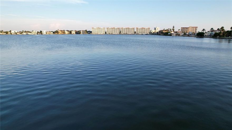 Seize this rare chance to own a fully cleared and build-ready waterfront lot on the protected Punkin Key Intracoastal Waterway in highly desirable Redington Shores! Featuring a sturdy 2018 cement seawall and breathtaking open-water views in a serene no-wake zone ideal for boating, fishing, and endless sunsets, this exceptional parcel is surrounded by upscale new constructions and provides the perfect canvas to create your custom luxury coastal dream home or family retreat with private dock. Just a short walk to miles of pristine white-sand Gulf beaches, embrace the ultimate Florida lifestyle—morning beach strolls, afternoon boat adventures, and stunning water vistas right from your future backyard—in one of Pinellas County's most coveted barrier island communities renowned for strong appreciation and premium waterfront living. Prime Intracoastal opportunities like this don't last long!