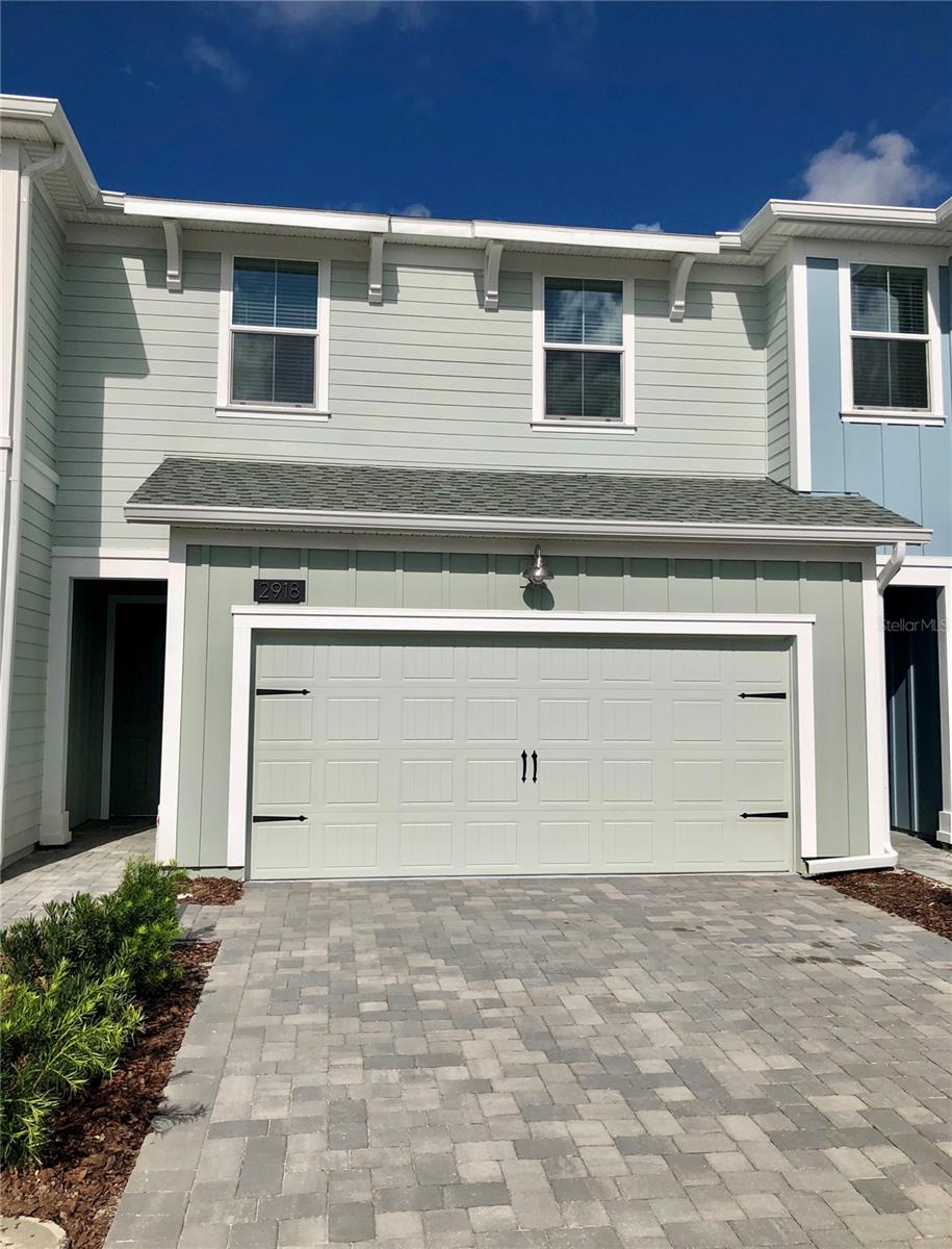 Discover modern living in this spacious two-story townhome in the highly desirable, master-planned community of Storey Lake. This home features 3 bedrooms, 2.5 bathrooms, and a 2-car garage, perfectly blending comfort and style. The open-concept first floor is an entertainer's dream, featuring a large great room and dining area that flow seamlessly into the gourmet kitchen. You'll love the luxury finishes, including: Gleaming Quartz Countertops, Modern 42” Cabinets, Sleek Slate Appliances,Custom Window Blinds,A private, brick-paved patio perfect for relaxing. For added convenience, a half bathroom is located on the main level, along with a flexible bonus space ideal for a home office or playroom. The second floor is a private retreat, featuring a spacious primary suite, two additional bedrooms, a second full bathroom, and a conveniently located laundry room.
Unbeatable Location: Your new home is just minutes away from Central Florida's major attractions. Walt Disney World: 5 miles, Lake Buena Vista & Disney Springs: 3 miles, The Loop Shopping Center: 2.5 miles,Orlando International Airport (MCO): 15 miles. Resort-Style Living: The fun never stops with an array of community amenities, including a resort-style pool, fitness center, dog park, playground, and even a hedge maze. A significant value, the HOA fee includes cable, high-speed internet, and phone service!
Whether you're looking for your dream home or a grand-slam investment property, this home is a must-see. Schedule your private showing today and discover why so many have chosen to call Storey Lake home!