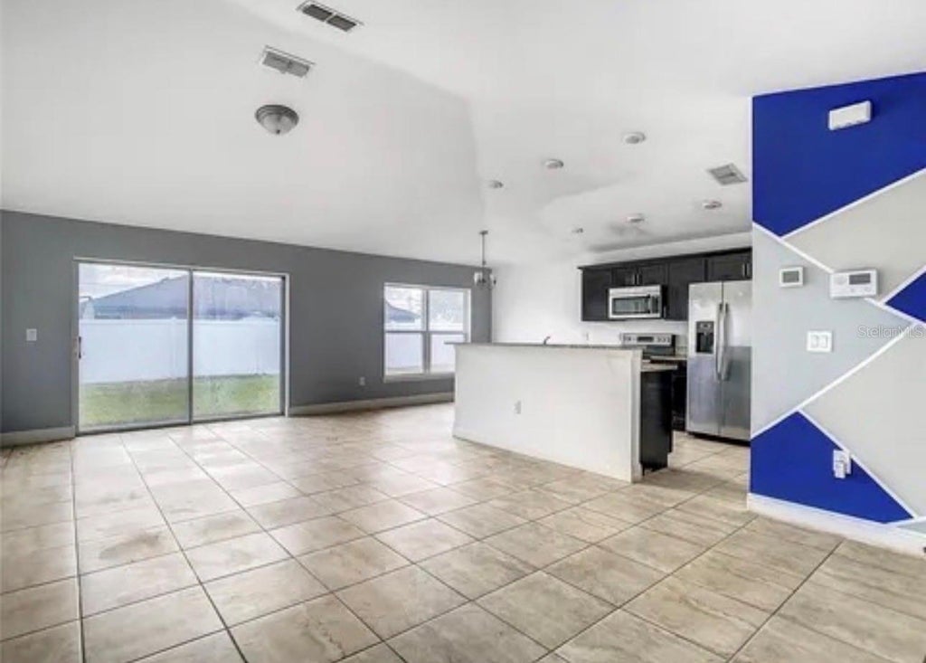 Photo of 277 Elm Court, Poinciana, FL 34759 (MLS # O6446864)
