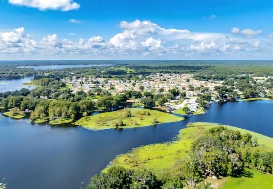 Welcome to your dream home on the water! This beautiful 2019 3-bedroom, 2-bathroom home is perfectly positioned on a Cul de sac with a waterfront
lot which has direct access to the scenic Tsala Apopka Chain of Lake that contains 15 main lakes and 22,000 acres of pure Florida nature. This property has the perfect combination of no HOA, no lot fees and low yearly taxes. It is simply a paradise for boating, fishing, wildlife or simply soaking in the peaceful lake views right from your backyard.
Step inside and experience a spacious open-concept layout, thoughtfully designed for effortless entertaining and relaxed, everyday living. The home features stylish luxury vinyl flooring throughout, and a modern kitchen equipped with stainless steel appliances, a brand-new refrigerator, and a new washer and dryer, both under warranty.
Start your mornings with a coffee and a breathtaking sunrise from the front of your home and wind down in the evenings on the new concrete back patio, the perfect spot to enjoy Florida’s stunning sunsets over the water.
Move-in ready and packed with updates, this home offers the ideal combination of comfort, style, and lakeside living.
This home comes with No HOA, giving you the freedom to enjoy your property without extra fees. Yet, you still get to enjoy the perks of a connected
community, including access to a private boat ramp and a lakefront pavilion, offering the perfect setup for weekend gatherings and launching.  
Don’t miss your chance, book a showing for one of the few truly affordable waterfront properties available.