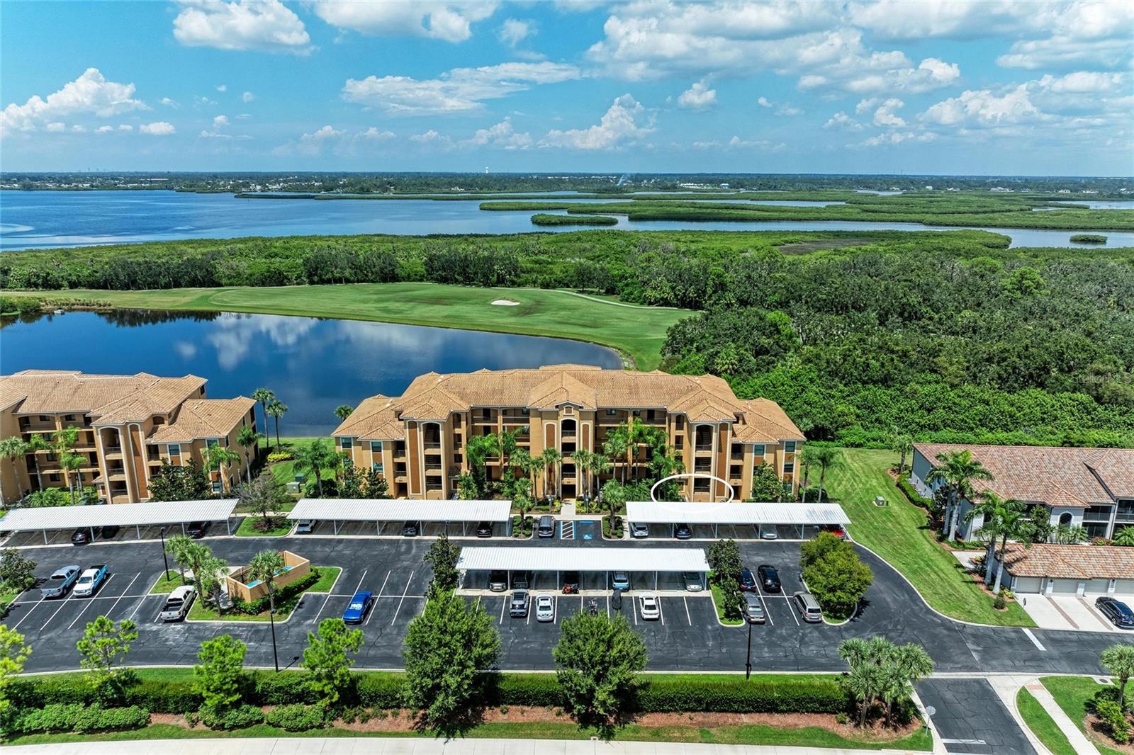 Whether you're seeking a full-time residence or a seasonal retreat, this TURNKEY FURNISHED 2-bedroom, 2-bath FIRST FLOOR condo offers the perfect blend of comfort and convenience. Located in the gated resort community of River Strand Golf & Country Club, this GOLF DEEDED property could be the one to call your next home. Step inside to an OPEN FLOOR PLAN where the kitchen flows seamlessly into the great room, all while showcasing stunning golf, water and lush green views. The private screened lanai—an ideal spot to relax and unwind, is everything you would want it to be offering a peaceful retreat to enjoy Florida's year-round sunshine. The owner has recently replaced the A/C (2025) and the unit also features a newer fridge and no carpet throughout making this home both practical and beautiful.
The first floor location provides easy access with no stairs or elevators, and the unit comes with an assigned covered carport for added convenience.
River Strand Golf & Country Club offers an unbeatable lifestyle with amenities for everyone including
27 holes of championship golf and a fully equipped pro shop,
two resort-style pools with spas, plus six satellite pools,
two fitness centers,
and tennis and pickleball courts too.
The clubhouse is currently undergoing exciting renovations soon to feature an elegant dining room, grille room, new tiki bar, and expanded outdoor dining.
Year-round social events—like live music, pool parties, and trivia nights create a strong sense of community.
Ideally located just minutes from the Marketplace at Heritage Harbour, with Costco, the new Target, and a growing selection of shops and dining options coming soon. And with Florida's breathtaking Gulf Coast beaches just a short drive away, you will have the best of both convenience and coastal charm. If you're seeking exceptional amenities and the essence of Florida living, come experience River Strand at its best—you may never want to leave!