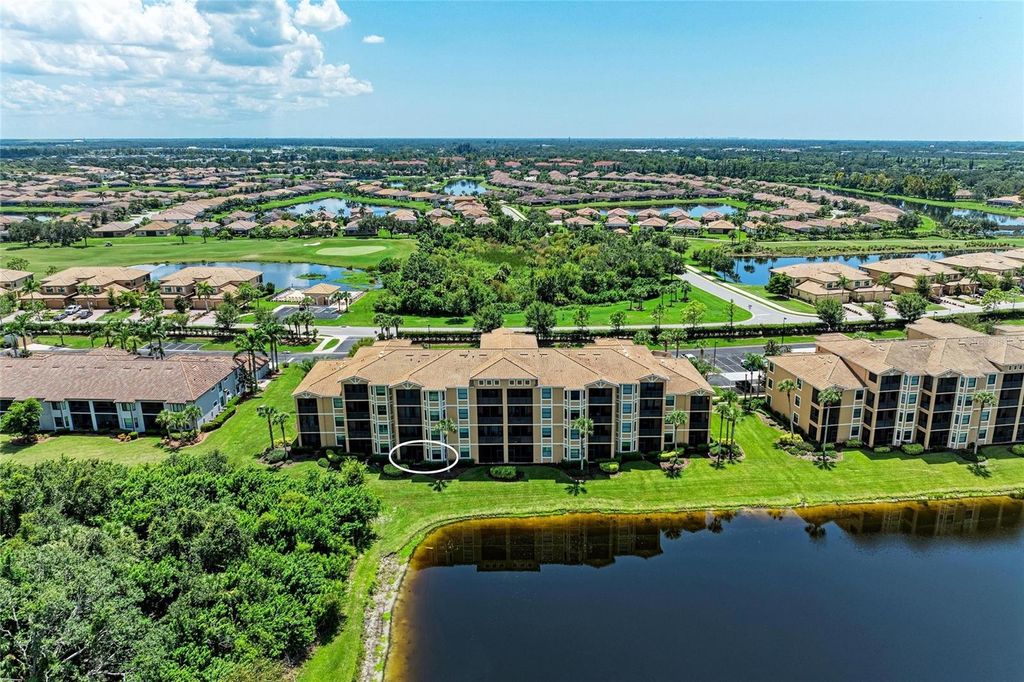 Photo of 6519 Grand Estuary Trail #106, Bradenton, FL 34212 (MLS # A4662856)