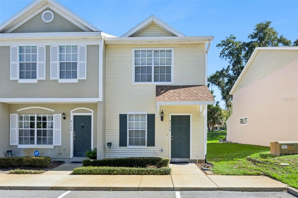 Photo of 4175 Plantation Cove Drive, Orlando, FL 32810 (MLS # O6442697)