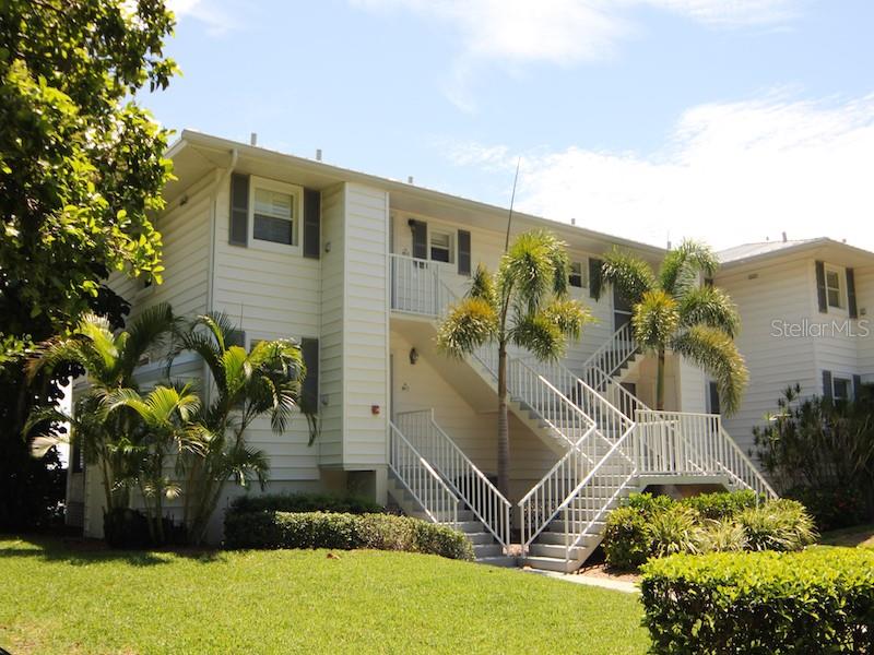 Enjoy a front row view of Charlotte Harbor! This one bedroom, one bath end unit was beautifully renovated in 2022. It boasts beautiful kitchen cabinets, custom built in bench seating with hidden locked owners storage, ocean beige dolomite kitchen counters ( harder than marble and more heat resistant than quartz). The bathroom has pompeii iscle quartz countertop. New AC in 2023!
Sit on your screened in lanai and watch the flora and fauna entertain you during the day. Wake up to a majestic sunrise! Marina Village is a serene and beautiful setting!