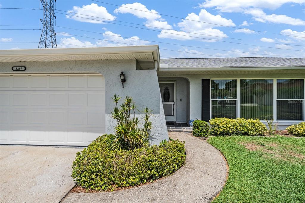 Photo of 3267 Springwood Drive, Clearwater, FL 33761 (MLS # TB8494407)