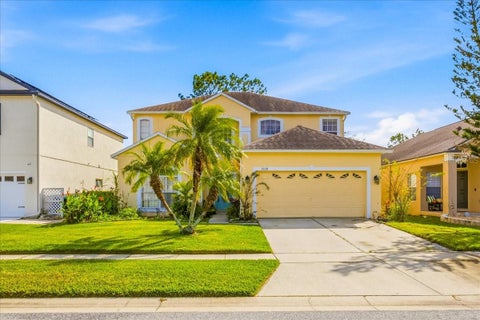 Photo of 13728 Hidden Forest Circle, Orlando, FL 32828 (MLS # O6453029)