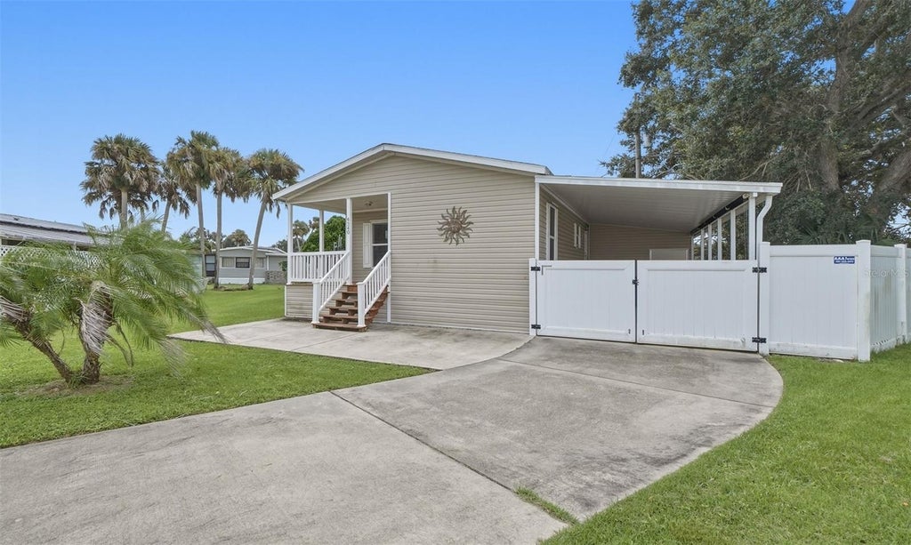 Photo of 4340 Cypress Way, Edgewater, FL 32141 (MLS # O6444639)