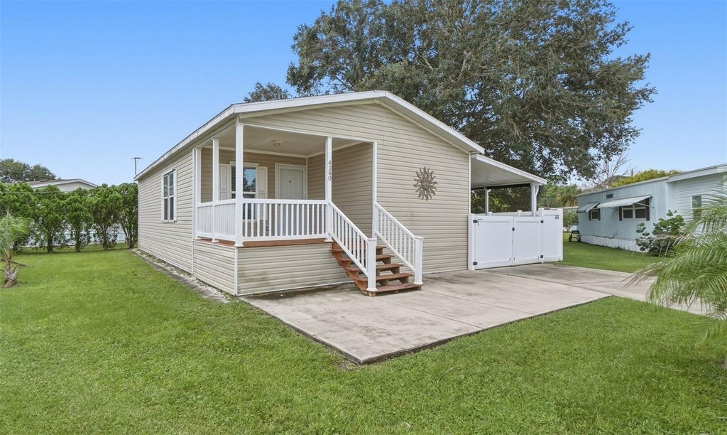 Photo of 4340 Cypress Way, Edgewater, FL 32141 (MLS # O6444639)
