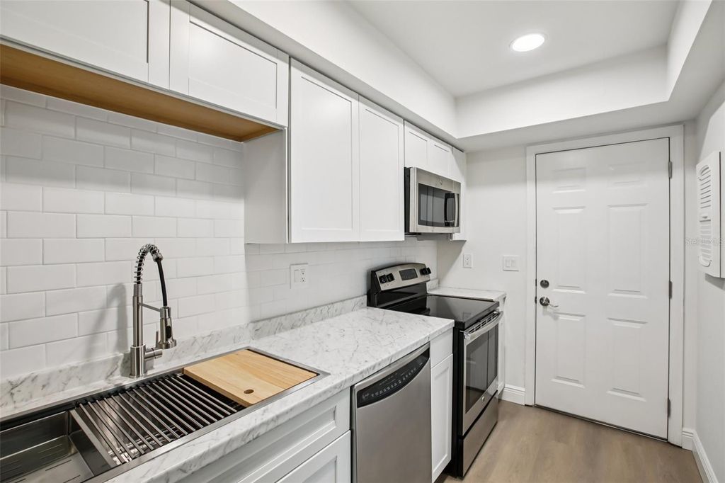 Photo of 2906 Lichen Lane #B, Clearwater, FL 33760 (MLS # TB8530925)