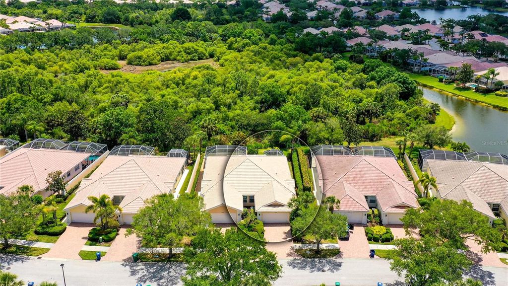 Photo of 7639 Pesaro Drive, Sarasota, FL 34238 (MLS # A4674482)