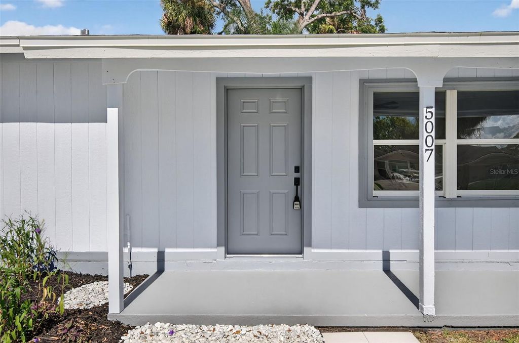 Photo of 5007 Stolls Avenue, Tampa, FL 33615 (MLS # O6347818)