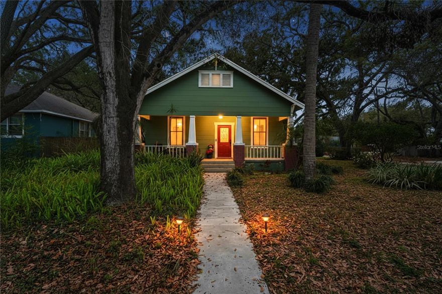 This charming 1924 bungalow sits on a beautiful corner lot in Seminole Heights and features 2 bedrooms, 1 bathroom, and a one-car garage. A large front porch welcomes you in and offers the perfect spot to relax and enjoy the neighborhood.

Inside, you'll find high ceilings, crown molding, original windows, and classic trim work that highlight the home's character. Hand-scraped laminate flooring runs throughout the main living areas, with ceramic tile in the wet spaces.

The kitchen is bright and functional, featuring stainless steel appliances, butcher block countertops, a closet pantry, and plenty of natural light. Both bedrooms include ceiling fans and great natural light, while the primary bedroom offers a walk-in closet.

The spacious bathroom includes double sinks and granite countertops. The laundry area is conveniently located inside the home.

Step outside to a large patio overlooking a fenced and beautifully landscaped yard with access to the detached garage. The home also includes a brand-new roof and a brand-new A/C system.

Located in the heart of Seminole Heights, you'll be just minutes from popular restaurants, local pubs, and neighborhood parks.