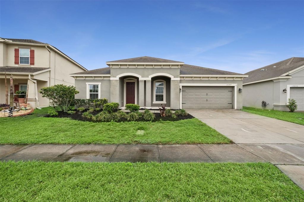Photo of 12397 Stone Bark Trail, Orlando, FL 32824 (MLS # O6397426)