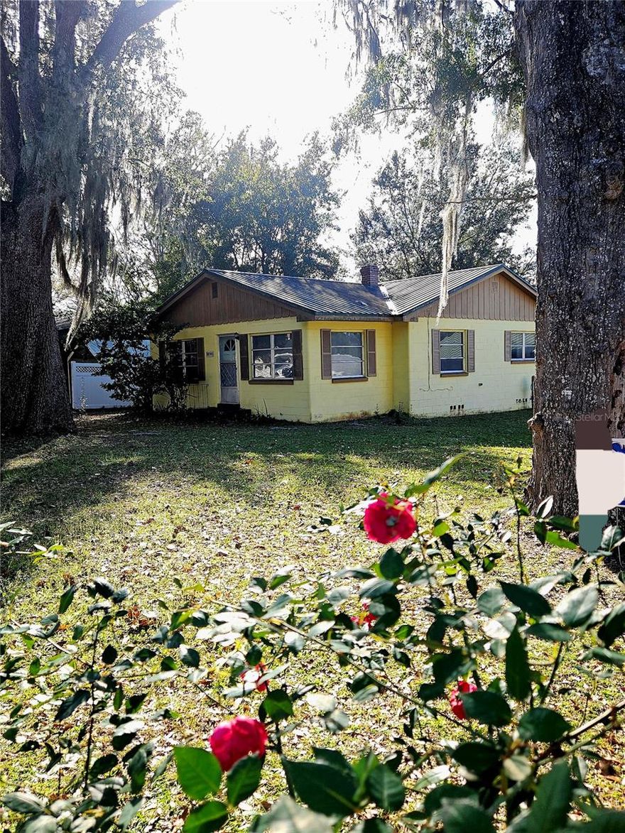 Great opportunity at this price, for a couple, a young family or investor.  Solid block home, 2 bedrooms and 1 1/2 baths with inside laundry room and 2 car detached garage, corner lot and fenced back yard. Needs some updating but move in ready.