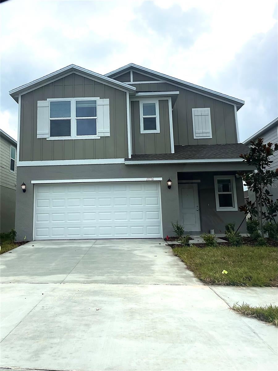 Photo of 11776 Noble Blossom Loop, Dade City, FL 33525 (MLS # J1005137)
