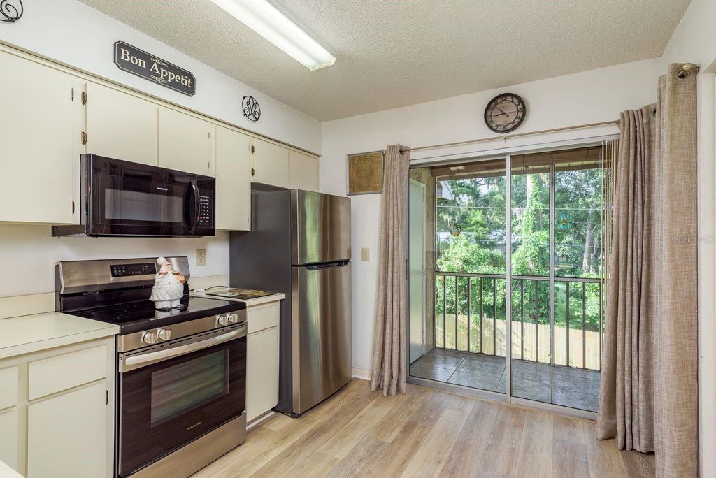 Photo of 6410 Spring Flower Drive #26, New Port Richey, FL 34653 (MLS # TB8404208)