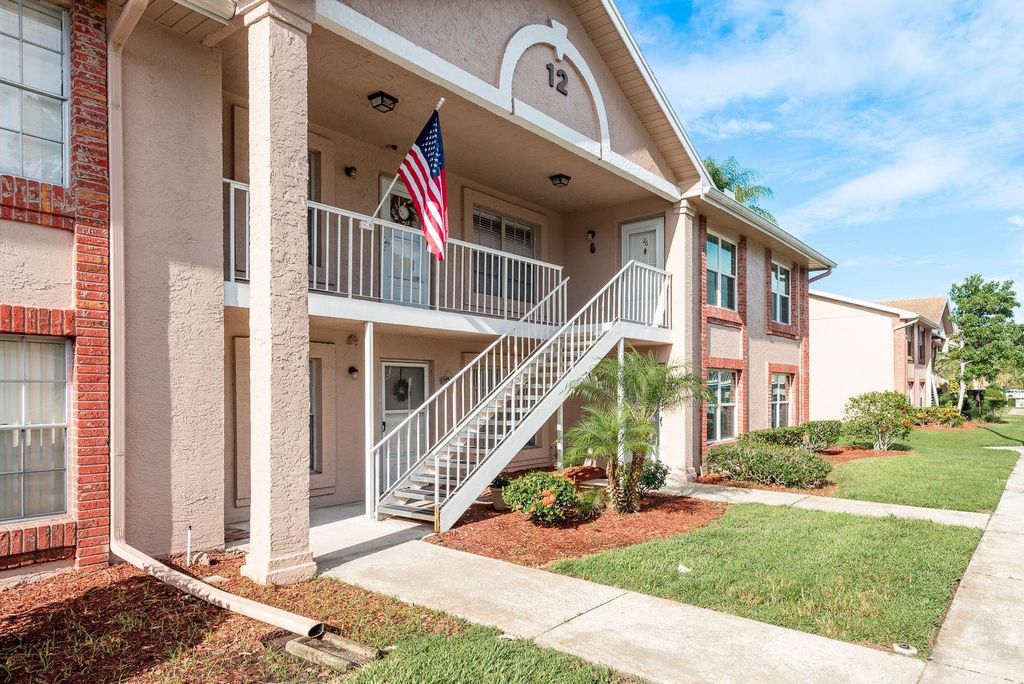 Photo of 6410 Spring Flower Drive #26, New Port Richey, FL 34653 (MLS # TB8404208)