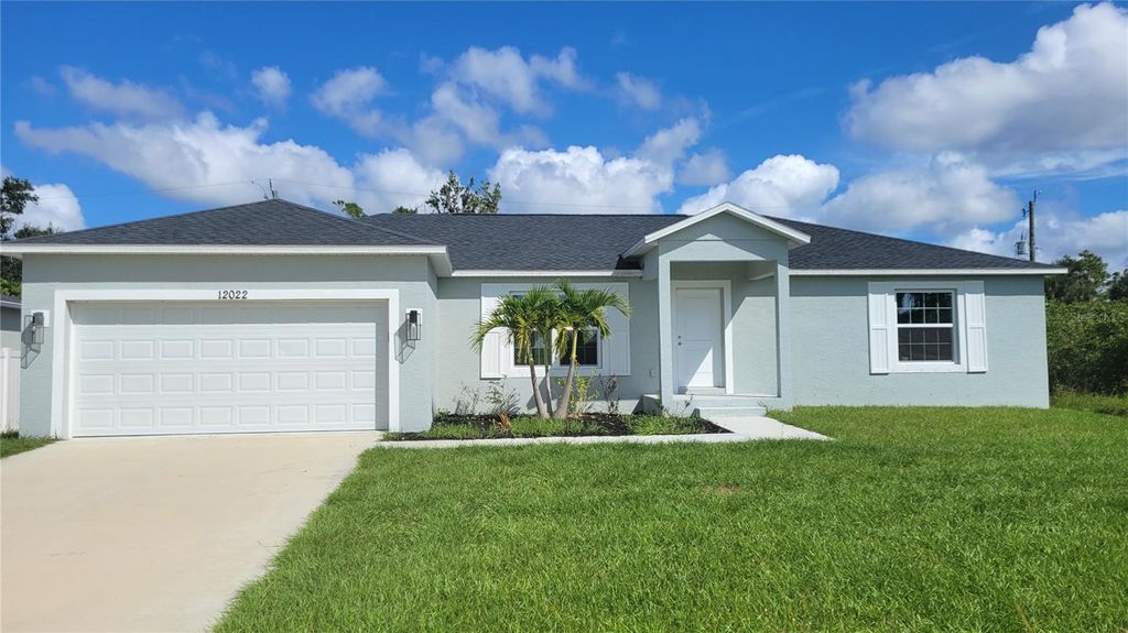 Photo of 12022 Waterman Avenue, Port Charlotte, FL 33981 (MLS # A4668049)