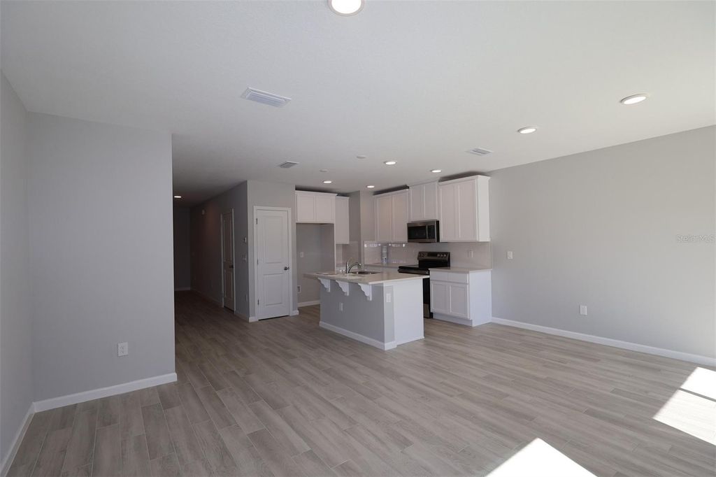 Photo of 4156 Campsite Loop, Orlando, FL 32824 (MLS # O6408067)