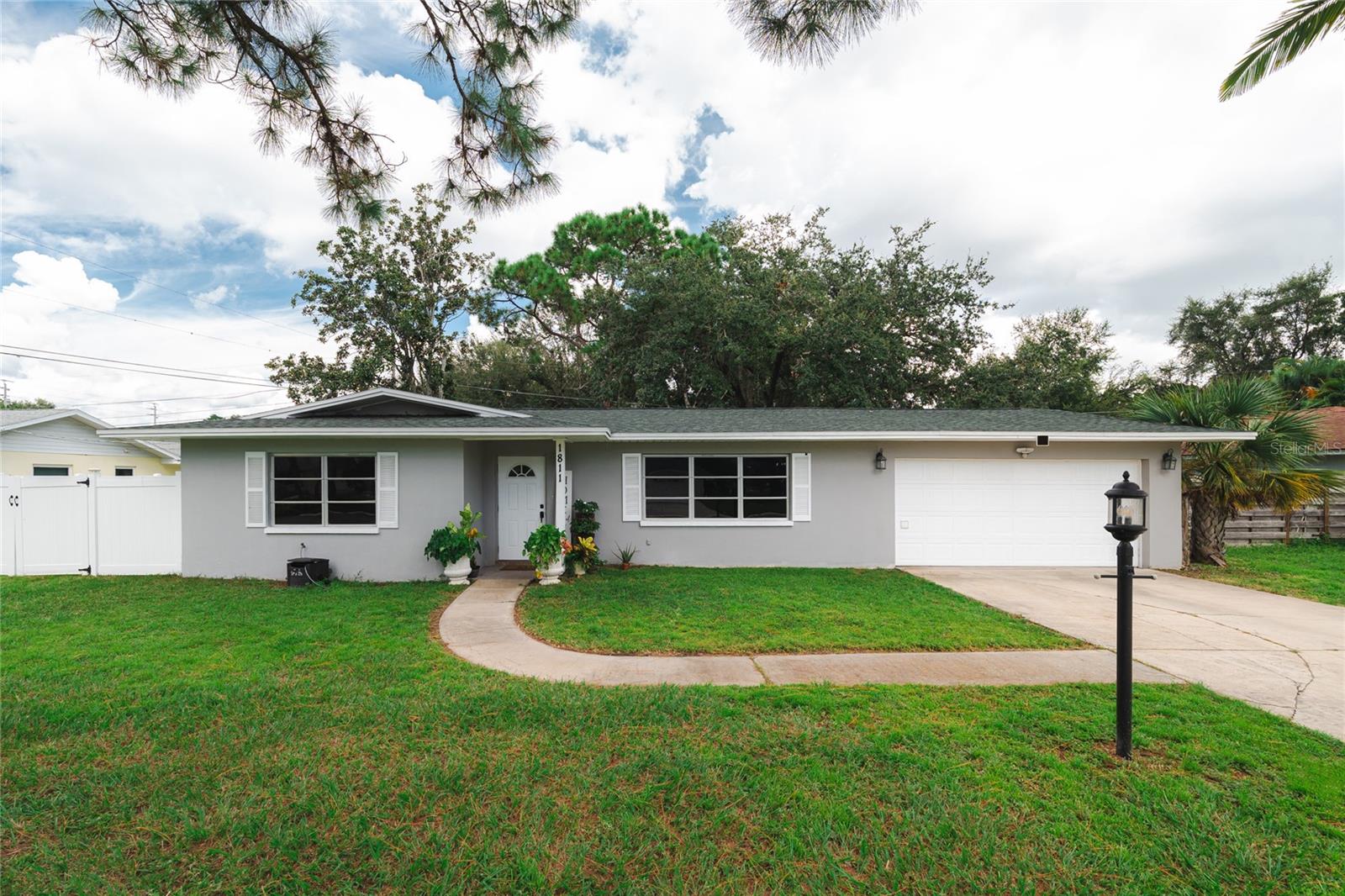 Discover your dream home in this beautiful 3-bed, 2-bath property. a true oasis of comfort. Every corner of this residence has been designed to provide you with a cozy and functional space. Enjoy spacious, light-filled bedrooms, renovated bathrooms, expansive outdoor areas, and a prime location. don't miss the chance to see it for yourself. All plumbing is brand new. Both bedrooms renovated. The roof is less than 2 years old and the AC is less than 4 years old. Electrical panel also was changed 3 years ago and all aluminum cables were replaced.