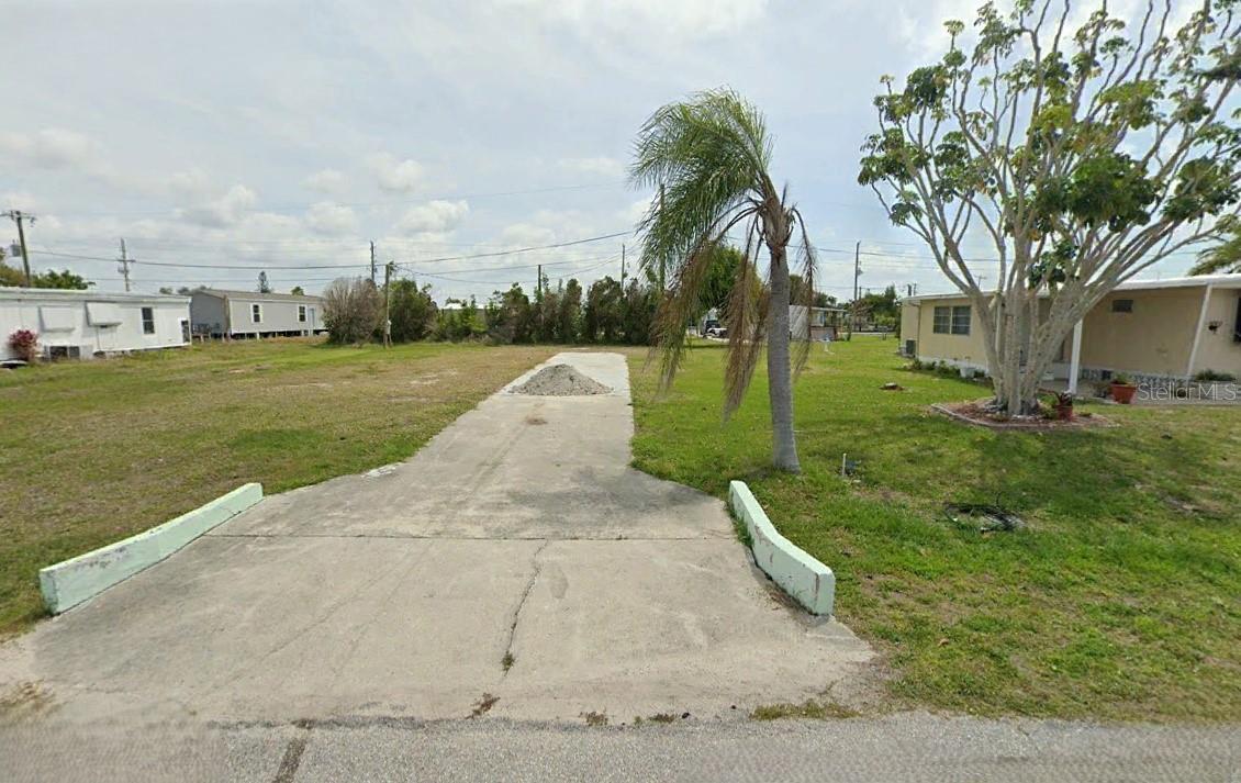 Nice vacant lot in Manatee Cove, the former Holiday Mobile Estates, a 55+ resident owned community with NO deed restrictions. Build you future home on this ideal lot that offers water, electric and sewer. There is an optional HOA which includes a clubhouse, boat ramp with access to the gulf, Pickleball, Yoga, shuffleboard, cards, trivia and much, much more. Englewood is the perfect location for those that enjoy outdoor activities and is a short distance from beaches, shopping, dining and golfing. Call today before you miss this opportunity to own in this sought after community. All information provided is deemed reliable but is not guaranteed and should be independently verified.