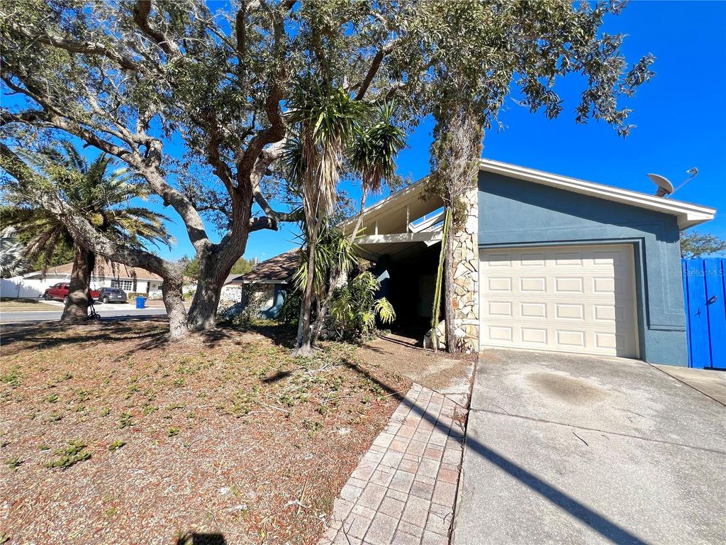 Photo of 1338 Calamondin Drive, Holiday, FL 34691 (MLS # TB8487270)