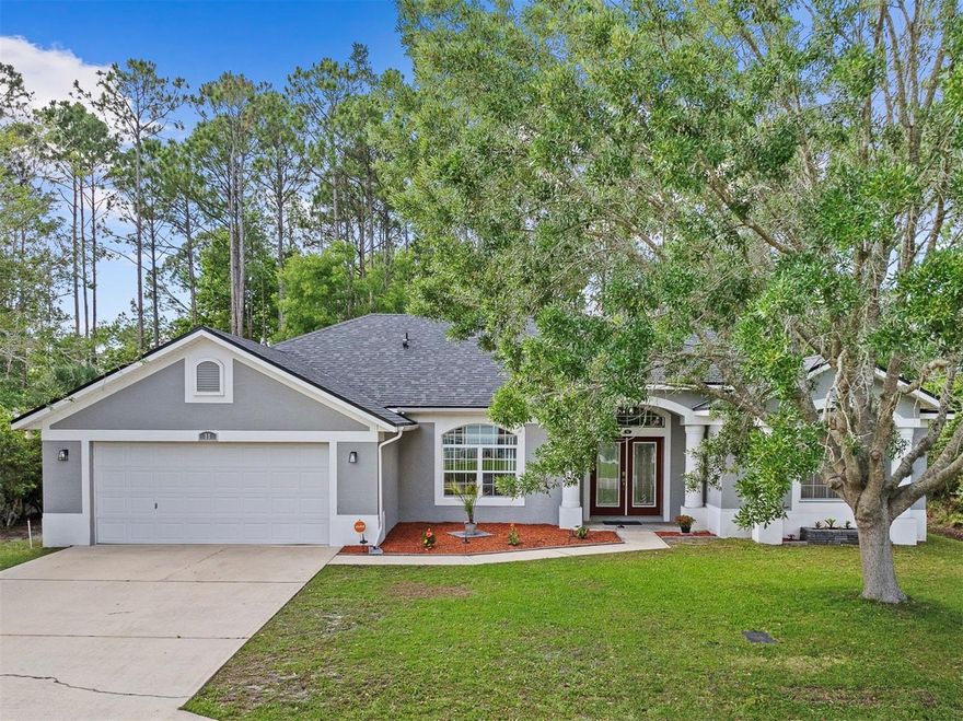 One or more photo(s) has been virtually staged. This custom 2,559 sq. ft. Seagate Homes home offers 4 bedrooms, 3 baths, and is much larger than it appears from the outside, with upgrades throughout. The triple-split floor plan provides exceptional flexibility for multi-generational living, with each area having access to its own bathroom. Inside, you’ll find high ceilings in every room, formal living and dining rooms, and a custom kitchen featuring glazed 42" wood cabinets, granite countertops, and a breakfast nook overlooking the pool. The spacious great room adjoins the screened pool deck, and when the doors are opened, the breezes create the perfect setting for entertaining. The primary suite features a large bedroom area, two oversized walk-in closets, and a spacious bathroom with double sinks, a walk-in shower, and a garden tub.Additional features include abundant closet space throughout, an inside laundry room, a 2-car garage, a new roof in 2023, new water heater in 2025, all new stainless steel kitchen appliances, washer, dryer, and kitchen sink disposal in 2023, and an HVAC system replaced in 2020. The home also offers a screened pool enclosure, a fully fenced yard, and so much more. Enjoy the pool with hot tub and fountain, ample deck space for sunning, and a covered rear patio. LOCATION, LOCATION... Surrounded by trees along the back and right side of the property, while still being conveniently close to schools, shopping, and easy access to I-95. If you are looking for a well-built home with plenty of space, this lovely home is a must-see.