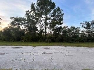 Photo of 818 Bougainville Drive, Indian Lake Estates, FL 33855 (MLS # TB8537688)