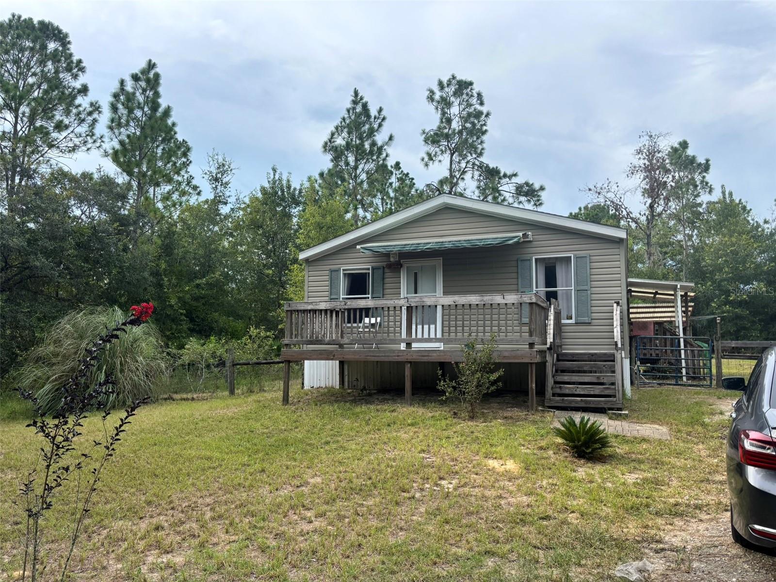 Priced to Sell!! Come home to Bronson and enjoy the peaceful country life while being close to all of the nature, wildlife and springs that Bronson has to offer. Convenient to Ocala and Gainesville with just a short drive. Plenty of yard to garden, relax or just have some outdoor fun. There are some minor repairs that will need to be done, such as the back door window and the front screen door to name a couple of items. Sold as is with no repairs. Seller inherited this home and does not live in the area. I don't think this will last at this price. There is already strong interest.