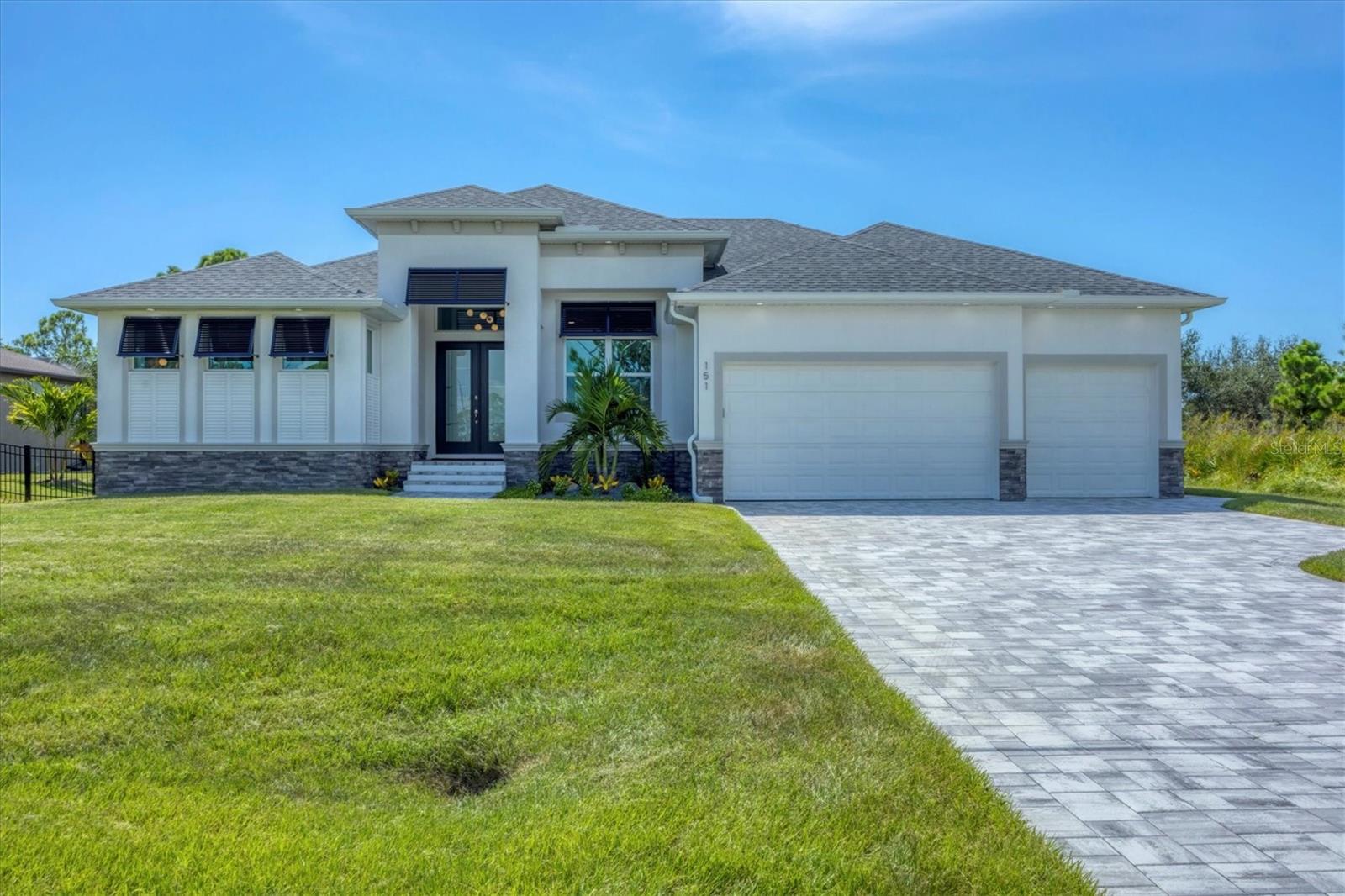 Why deal with all the hassles of new construction? This home checks off all the "must haves"..
..And it's MOVE IN READY!!
SPECTACULAR "NEXT TO NEW" DM DEAN MASTERPIECE..BEAUTIFULLY FURNISHED..located just a few steps from the beautiful Cape Haze Pioneer Trail.
Built in 2024 by the renowned DM Dean Home Builders—celebrated for their exceptional craftsmanship and design—this FURNISHED 3-bedroom, 2-bath + den luxury home with over 2,000 sqft of living space and a apoxy finished 3 car garage is a true showstopper. Located in desirable Rotonda Sands, a deed-restricted community surrounded by natural beauty, this home looks and feels like a designer model.
Step inside to find ceramic tile flooring throughout, impact windows, and top-of-the-line finishes at every turn. The spacious kitchen features gorgeous quartz countertops, an oversized 9-foot island, under-cabinet lighting, wine fridge and plenty of room to entertain. The open-concept living area offers a cozy fireplace and large sliding doors that lead to the lanai.
The primary suite is oversized with direct access to the pool deck, and the beautiful en suite bathroom includes a tiled "car wash" shower, double sinks , "his & her" walk in closets & top of the line finishes. This beauty offers quartz countertops through out.
Step outside to your private tropical retreat—There you will find a 11' x 24' heated saltwater pool and hot tub combo, surrounded by a panoramic screen enclosure that showcases views of the lush greenbelt behind the home, offering total privacy. The oversized 25' x 64' lanai also features a gorgeous stone outdoor kitchen ..perfect for entertaining.
The curb appeal is heightened by the paved driveway and walkway, in addition to the gorgeous Bahama shutters...
There are so many upgrades on this home...You HAVE to see it!!
This popular community is in a relatively quiet part of town away from the hustle bustle, yet it is minutes from great shopping, restaurants, several golf courses and of course the pristine Gulf beaches. If you are a sports fan, you will be a short drive to two spring training camps.
This home is the perfect blend of style, quality, and function—offered beautifully furnished and ready for immediate enjoyment. Don't miss this rare opportunity to own a truly exceptional home in paradise!