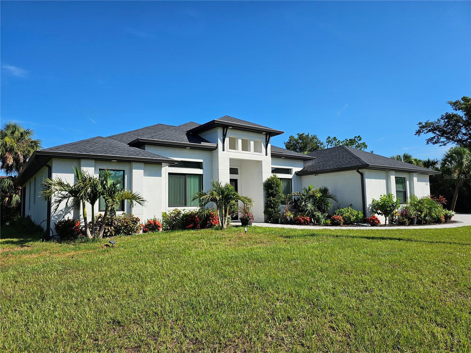 Spacious Comfort Meets Outdoor Luxury – Your Dream Home Awaits! Welcome to this beautifully maintained 3-bedroom, 2-bathroom home offering 2,100 square feet of thoughtfully designed living space on a rare double lot. Located in a quiet and desirable neighborhood, this home effortlessly blends comfort, function, and impressive outdoor living. Step inside to an open and airy floor plan perfect for both everyday living and entertaining. The generous layout includes a spacious kitchen, comfortable living and dining areas, and three well-sized bedrooms— including a serene primary suite with an en-suite bath. Car enthusiasts and hobbyists will love the oversized 3-car garage and driveway providing plenty of room for vehicles, storage, and workspace. But the real showstopper? The humongous lanai—a true outdoor retreat that invites you to relax, entertain, or enjoy quiet mornings in your own private paradise. With the extra space provided by the double lot, there’s room to add a pool, garden, or create your own custom outdoor experience. This home is the perfect balance of indoor comfort and outdoor living. Don’t miss your chance to own a slice of space and serenity—schedule your private showing today!