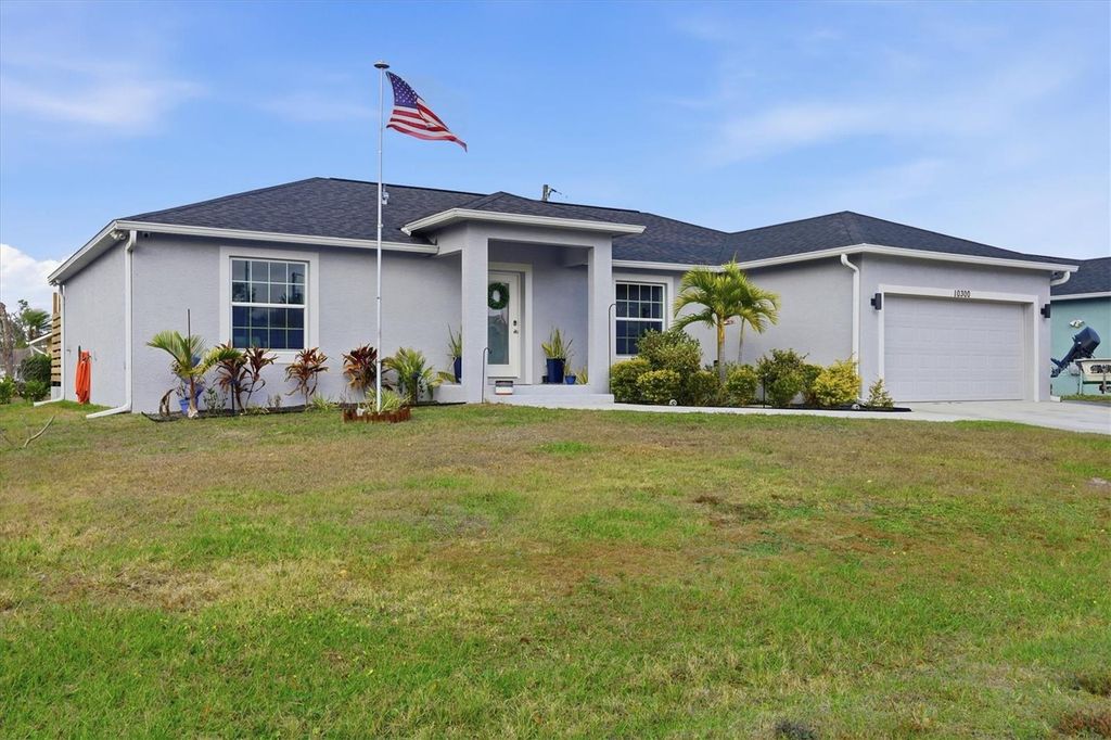 Photo of 10300 Sandrift Avenue, Englewood, FL 34224 (MLS # D6145875)