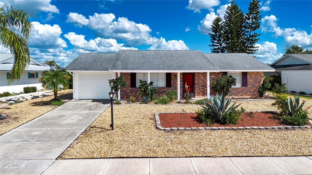 Photo of 1507 N Lake Drive, Sun City Center, FL 33573 (MLS # TB8555058)