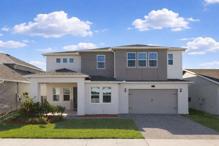 One or more photo(s) has been virtually staged. Stunning lake-view home that is better than new, offering extensive upgrades and a highly desirable open floor plan. This beautifully designed residence features expansive living spaces filled with natural light and seamless flow, perfect for both everyday living and entertaining.

Enjoy tranquil water views from the main living areas, creating a peaceful and elegant atmosphere throughout the home. The open-concept layout connects the kitchen, dining, and great room, enhanced by numerous upgrades throughout, making this home stand out from new construction.

The property offers three bonus flex rooms, providing exceptional versatility for a home office, media room, playroom, gym, or guest space—ideal for today’s flexible lifestyle needs.

Thoughtfully upgraded and meticulously maintained, this home delivers the appeal of new construction without the wait, and with added value already in place. A rare opportunity to own a move-in-ready, lake-view home with space, style, and flexibility.