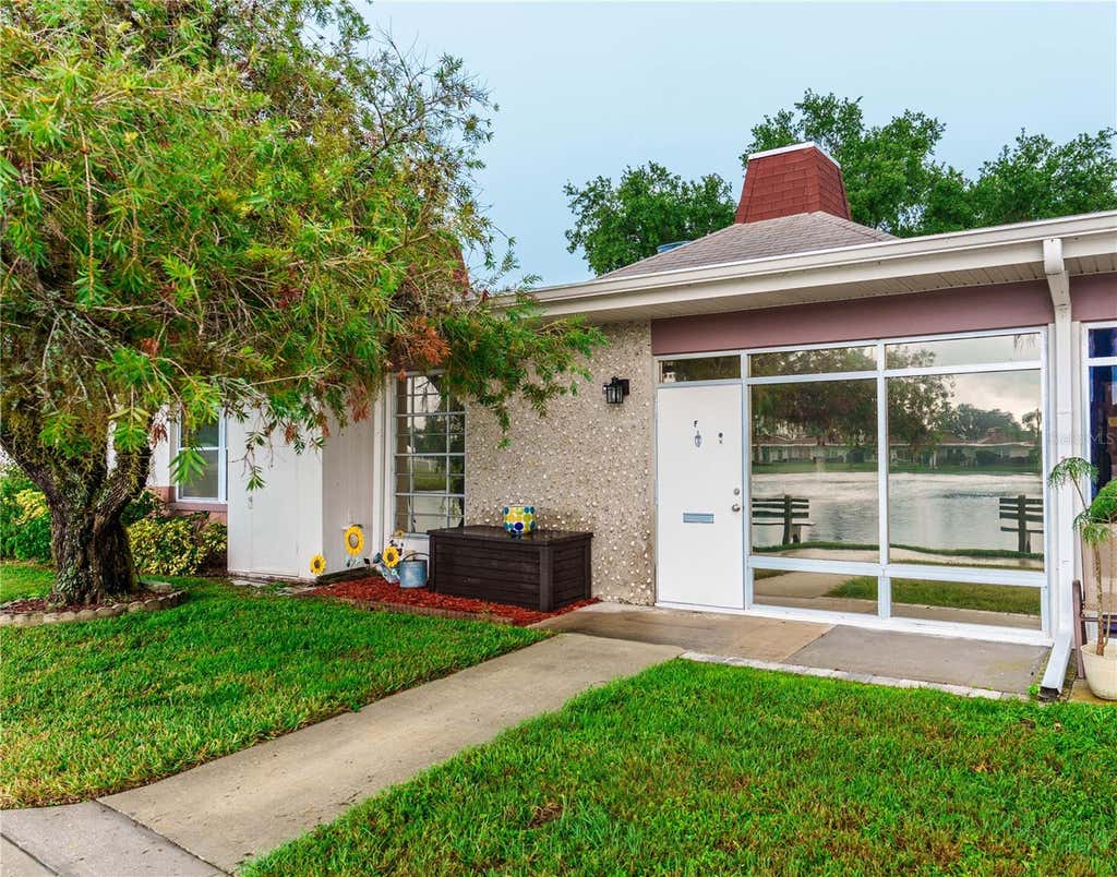 Photo of 4318 Tahitian Gardens Circle #F, Holiday, FL 34691 (MLS # O6429748)