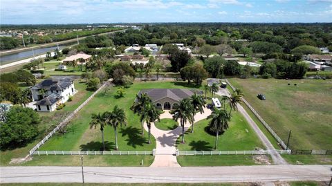 Photo of 4810 SW 198 Terrace, Southwest Ranches, FL 33332 (MLS # OM721191)