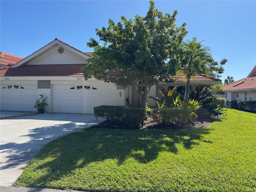 Come see this attractive Villa with its Serene LAKE VIEW, nestled in the well-kept secret of PARK PLACE VILLAS. Conveniently located back from Proctor Road at Lockwood Ridge, you’ll have EASY ACCESS TO ALL POINTS SARASOTA! 
* New TILE ROOF and New IMPACT-RESISTANT WINDOWS plus a New SCREENED PORCH are important improvements that have been made in the past few years * Light and Bright Villa * VAULTED ceilings * SPACIOUS living area that allows for Formal Dining 
Area * FRENCH DOORS from Living Room to Kitchen/Breakfast Room/Family Room * Split Bedroom Plan * Primary Suite has Bay Windows, a Walk-in Closet and an extra-large Bathroom * Luxury Vinyl Flooring throughout * Customized Blinds and Window Treatments * Interior Laundry area has stacked full size washer/dryer * This Villa has the desirable Advantage of being on the Private cul-de-sac at the rear of this small community. The POOL is nearby and, more often than not, waiting for you alone! * Spring-fed Lake * Pets are welcome * BONUS: Lychee Tree at the entrance bears delicious fruit every other year –get ready for 2026!
You’re sure to enjoy living in this Private, Peaceful home!