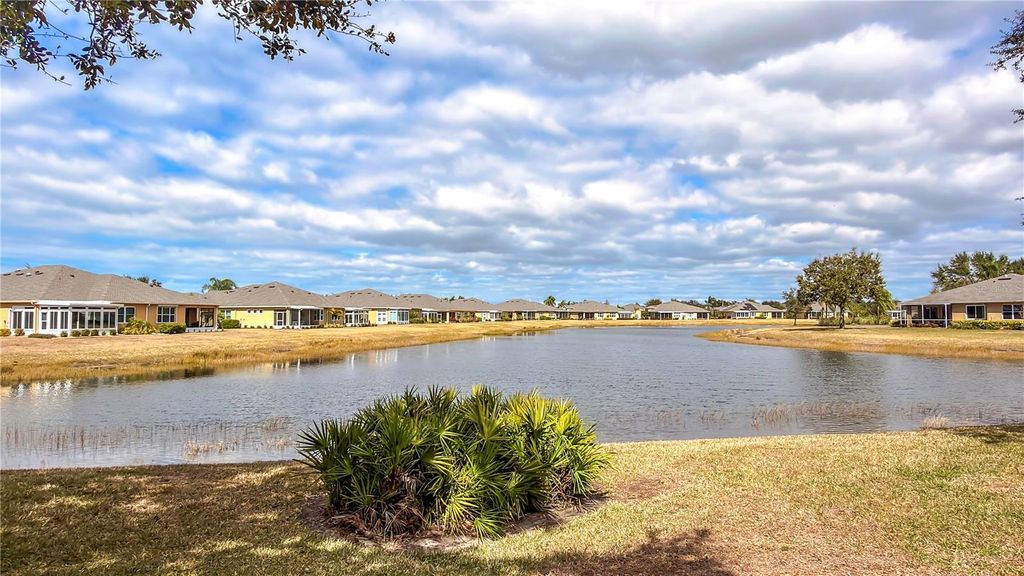 Photo of 2069 Sifield Greens Way #102, Sun City Center, FL 33573 (MLS # TB8476464)