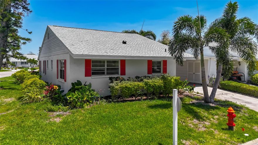 One or more photo(s) has been virtually staged. Welcome to Mount Vernon; a popular waterfront community, famous for its 90 acres of natural park-like beauty set directly on the bay with lush green open spaces & an offering of boating activities!  Enjoy the serenity of this lovely, spacious, and bright villa with no shared walls and a storage shed conveniently located outside your door. The home features new laminate flooring throughout, large ceramic tile floors in the bathrooms, some newer kitchen cabinetry, and a new AC installed in 2025. An abundance of windows in every room fills the home with natural light and showcases the surrounding beauty.
There is an incredible array of amenities, ensuring there is always something to enjoy. If you love the beach, it is only approximately 3 miles away! Boat slips can be rented for $25 a year. Amenities include a huge remodeled clubhouse, banquet room, billiards, ping- pong, extensive library, game room, lakeside veranda, heated pool, tennis, pickleball, and covered shuffleboard courts, spa, sauna, workshop, wood shop, chip and putting green. You can get your steps in along the many walking paths, relax at the butterfly garden and bayfront park, and enjoy the abundance of Florida wildlife. Truly a peaceful paradise! Additional features include kayak launch and storage areas, along with numerous lakes and ponds throughout the impeccably manicured grounds. Also worth mentioning are the bayside pavilion, lakeside gazebo and a variety of activities and social events hosted by the community. Seller motivation is reflected in the price. 
If you are looking for a friendly, charming, picturesque, and tranquil active outdoor type of community, don't hesitate to call this Home!