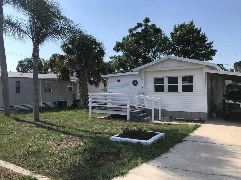 Photo of 7037 Lofty Drive, Port Richey, FL 34668 (MLS # TB8463353)