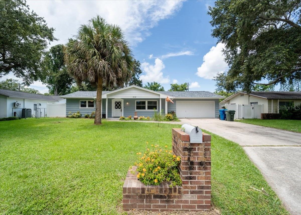 Welcome to 1012 Irene Avenue! Live the beach lifestyle without the beach-area price tag. Set on a quiet, mature street in a friendly, well-kept neighborhood, this thoughtfully updated 4-bed, 2-bath home pairs everyday comfort with true coastal convenience. In minutes you can be on the Causeway headed to India Rocks, Belleair, and Sand Key Park, with Clearwater Beach and Pier 60 close by for sunset strolls. Weekends write themselves with Largo Central Park, the Florida Botanical Gardens, Eagle Lake Park, and the Pinellas Trail nearby; shopping and dining are a breeze at Largo Mall, Clearwater Mall, and the cafés of Downtown Largo and Belleair Bluffs. A new 2025 roof delivers peace of mind, while the new concrete/paver patio extends living outdoors—perfect for morning coffee, weekend cookouts, and cozy winter evenings around the fire. Inside, bright, easy-flow spaces invite entertaining, and the split floorplan features a stand-alone primary bedroom for privacy. Each bedroom is incredibly spacious, offering maximum comfort and flexibility for guests, work, or play. Out back, the yard’s perimeter is lined with hibiscus, adding color, privacy, and that unmistakable Florida feel. Move-in-ready finishes complete a welcoming retreat close to everything.