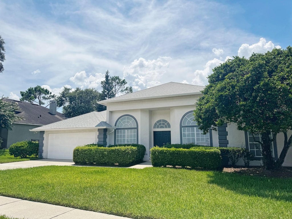 Photo of 824 Palm Cove Drive, Orlando, FL 32835 (MLS # O6422116)