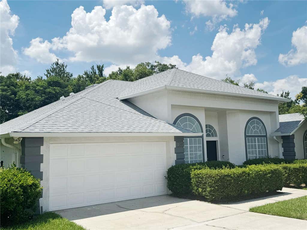 Photo of 824 Palm Cove Drive, Orlando, FL 32835 (MLS # O6422116)