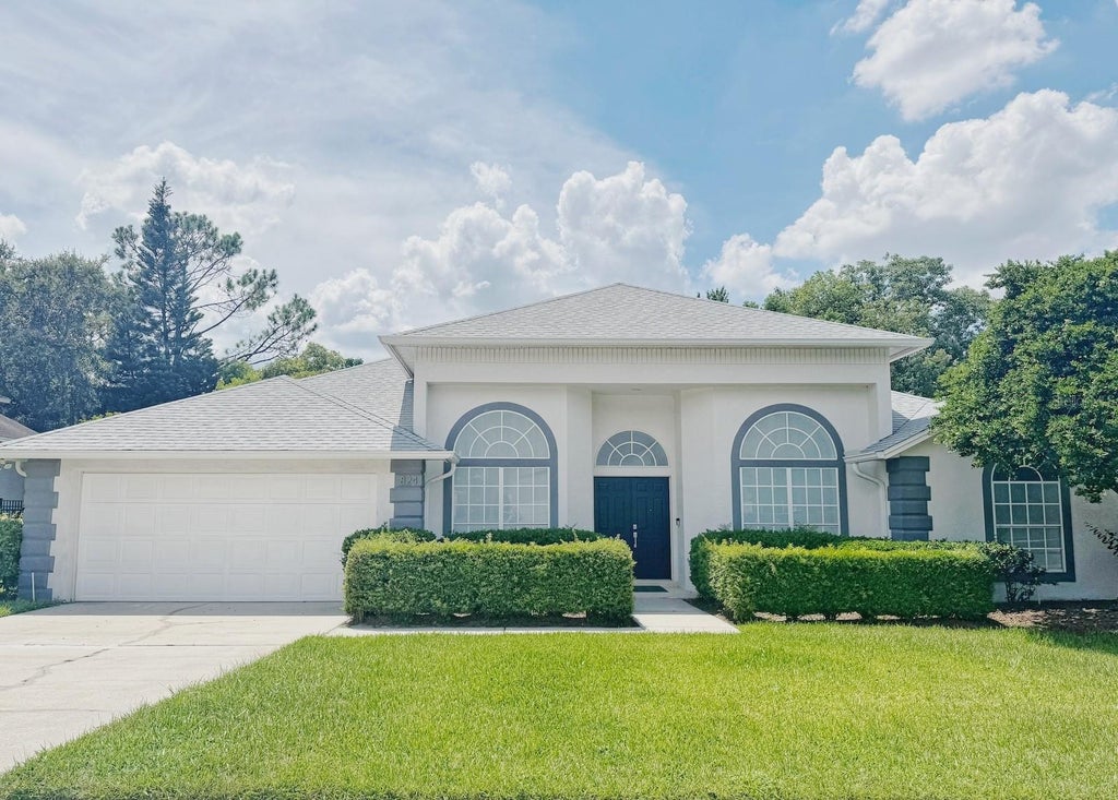 Photo of 824 Palm Cove Drive, Orlando, FL 32835 (MLS # O6422116)