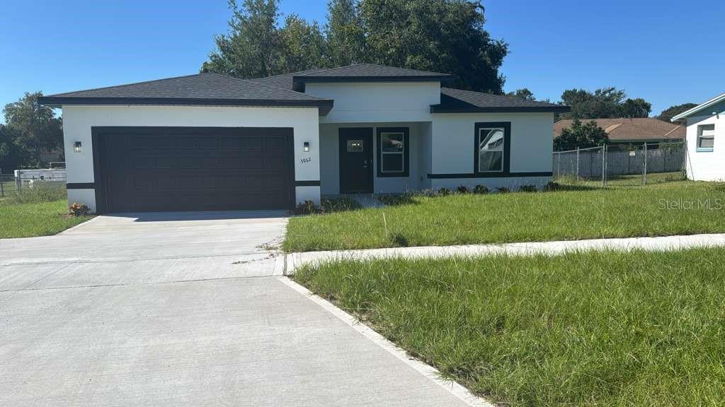 All warranties will be send to the buyer and the final walkthrough will be possible before closing!! 9 minutes away from Winn-Dixie, Walgreens and Marion Oaks Shopping Center!!! Welcome to this cozy home that mixes comfort with style. It has 4 bedrooms and 2 bathrooms, making it just right for family life. When you walk in, you'll see a big living area that flows into a well-stocked kitchen, great for both chilling out and having friends over. The kitchen comes with modern appliances, lots of cabinet space, and a breakfast bar, making it the main spot for family hangouts and casual meals. Next to the kitchen is the dining room, great for dinner parties or family dinners. The house features four roomy bedrooms where you can relax. The main bedroom has its own bathroom and walk-in closets, offering a space for the owners. The other bedrooms are flexible and can be used as a home office, guest room, or playroom, depending on what you need.