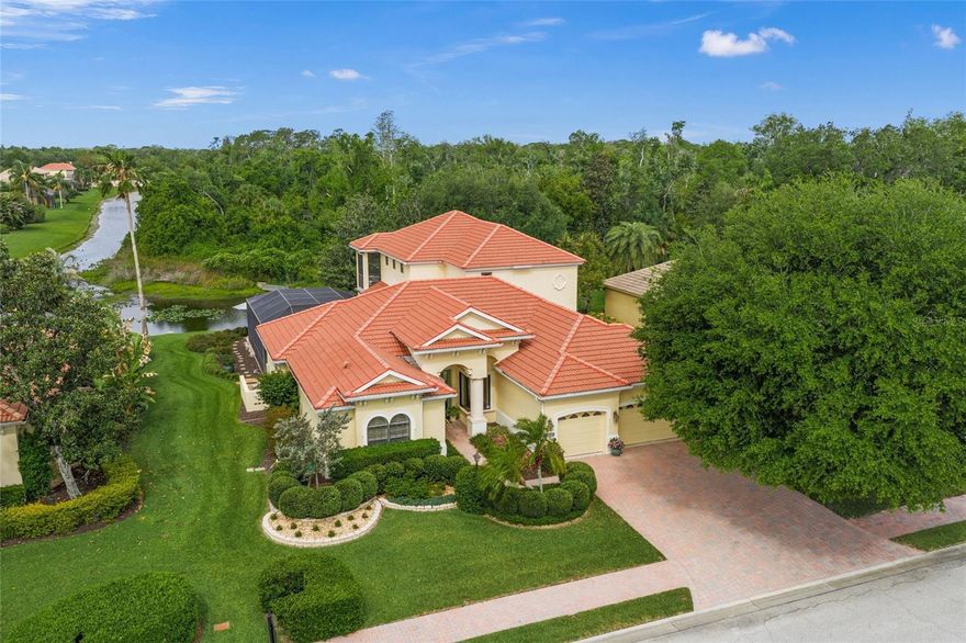 This is the one * QUALITY BUILT BY LEE WETHERINGTON HOMES * LOCATED BEHIND THE GATES OF RARELY AVAILABLE TUSCANA WHERE YOUR DREAM HOME AWAITS * 'A' RATED SCHOOL DISTRICT * Lovingly cared for by the original owners and the PRIDE OF OWNERSHIP SHOWS * This IMMACULATE home will not disappoint * This Family Estate Home is located on a Premium Lot backing to a 10 Acre Preserve & Pond providing a natural oasis & sense of tranquility * Enjoy the INCREDIBLE SUNSETS * This Custom Built Casablanca model is meticulously designed with 4 Bedrooms that are ALL EN-SUITES + 5 FULL BATHS + a Private Den/Office * The heart of the house is undoubtedly the LOVINGLY RENOVATED CHEF'S KITCHEN with NEW QUARTZITE Countertops, Upgraded Monogram Appliances, Custom Wood Cabinets, NATURAL GAS COOK-TOP, Built-in Oven, an Oversized Refrigerator & a Walk-in Pantry * The Gourmet Kitchen is open to the SPACIOUS FAMILY ROOM * Formal Living Room & Formal Dining Room * The Primary Suite is a sanctuary of comfort and a true retreat that features a THOUGHTFULLY REIMAGINED Spa-style Bath with NEW Walk-in Shower, Freestanding Tub, Dual Vanities & Dual Walk-in Closets * Upstairs is perfect for Guests or a private getaway with 2 En-Suite Bedrooms & a 23 x 17 Bonus Room with a Wet Bar, Mini Refrigerator, Ice Maker & Microwave * Relax on your 2nd story Screened Veranda - THE VIEWS ARE INCREDIBLE! * All of this wraps your Outdoor Oasis with Double Lanais * The Main Lanai is 21x16 with a Built-in Kitchen and a GAS Fireplace * Welcome to Party Central with a Beer Keg Built-in, Mini Refrigerator, Sink, GAS Grill & a Built-in Exhaust System * Travertine Deck * Your SALTWATER Pool & Spa is GAS Heated with a beach style shelf PLUS an Extended Paver Deck outside of the Pool Cage for additional enjoyment * You will not find a better outdoor area than this * Very Private Setting backing to tranquil 10 Acre Preserve & Pond to enjoy the spectacular sunsets * This is the perfect home for entertaining friends & family or simply relaxing in your slice of paradise * 3 Car Garage * NATURAL GAS * Volume Ceilings * Crown Molding * Tray Ceilings * Well for Yard Irrigation * Beautiful Landscaping  + Paver Driveway + Sidewalks * Friendly GATED Neighborhood of only 99 Homes * NO CDD Fees * Located in the heart of Sarasota and close to shopping, dining, golf courses & more! * A short drive to World Famous Siesta Key Beach as well as UTC Mall * This truly outstanding home is a MUST SEE * Furniture is available under separate negotiation * One look & youll fall in love * Run, don't walk! *